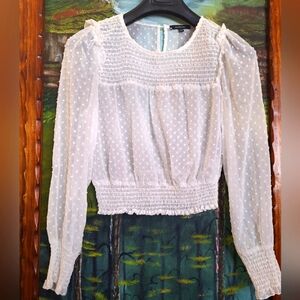Woman blouse. Long sleeves. Size large-med. Excellent condition